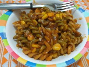 Pasta in red sauce with vegetables - This is a quick version of pasta cooked in red sauce along with some vegetables. Ideal for a quick dinner or even as a quick snack for the kids.