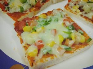 Bread Pizza - Perfect alternative to our regular pizza. Love Pizza? Then try this instant pizza recipe. Perfect for kids as well as for grown ups.