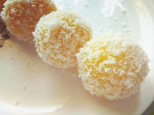 Rasmalai Coconut Ladoos / Rasmalai Coconut Balls are cute little fusion dessert bites. Made using the classic Indian sweet Rasmalai and Coconut!