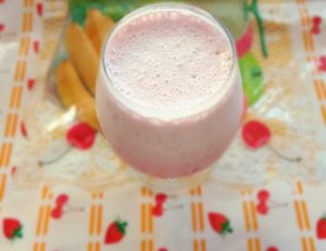 Chilled Strawberry Milkshake - A glass of chilled milkshake, prepared using fresh strawberries. Perfect fruity summer milkshake!