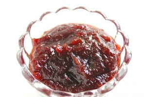 Quick Cranberry Sauce using dried cranberries. Enjoy it with a bread toast or add it on a scoop of vanilla ice-cream. Homemade Cranberry Sauce can't get easier than this!