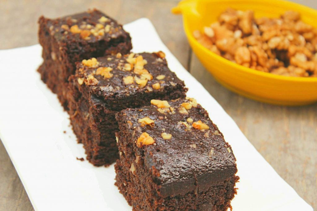 Moist Chocolate Walnut Cake - Amazing combination of chocolate and walnuts in form of a cake. This easy chocolate walnut cake recipe would surely become your one of the favorite eggless cake recipes. Just give it a try!