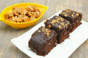 Moist Chocolate Walnut Cake - Amazing combination of chocolate and walnuts in form of a cake. This easy chocolate walnut cake recipe would surely become your one of the favorite eggless cake recipes. Just give it a try!