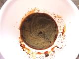 Add instant coffee powder and hot water